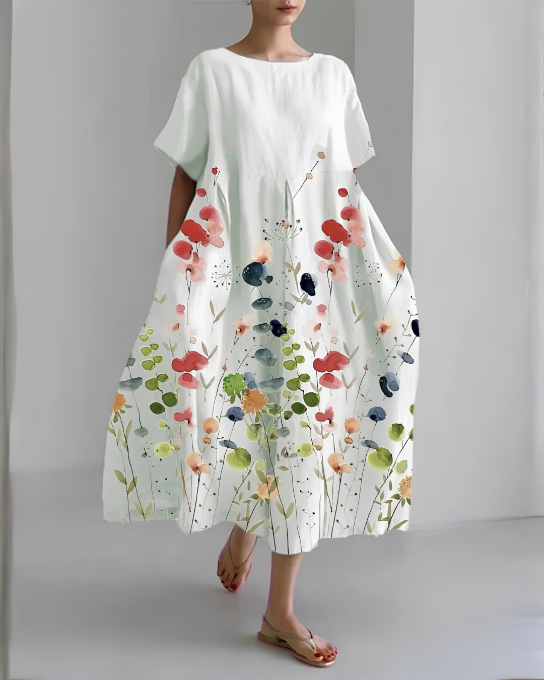 Beatriz | Flowy white midi dress with a delicate floral print